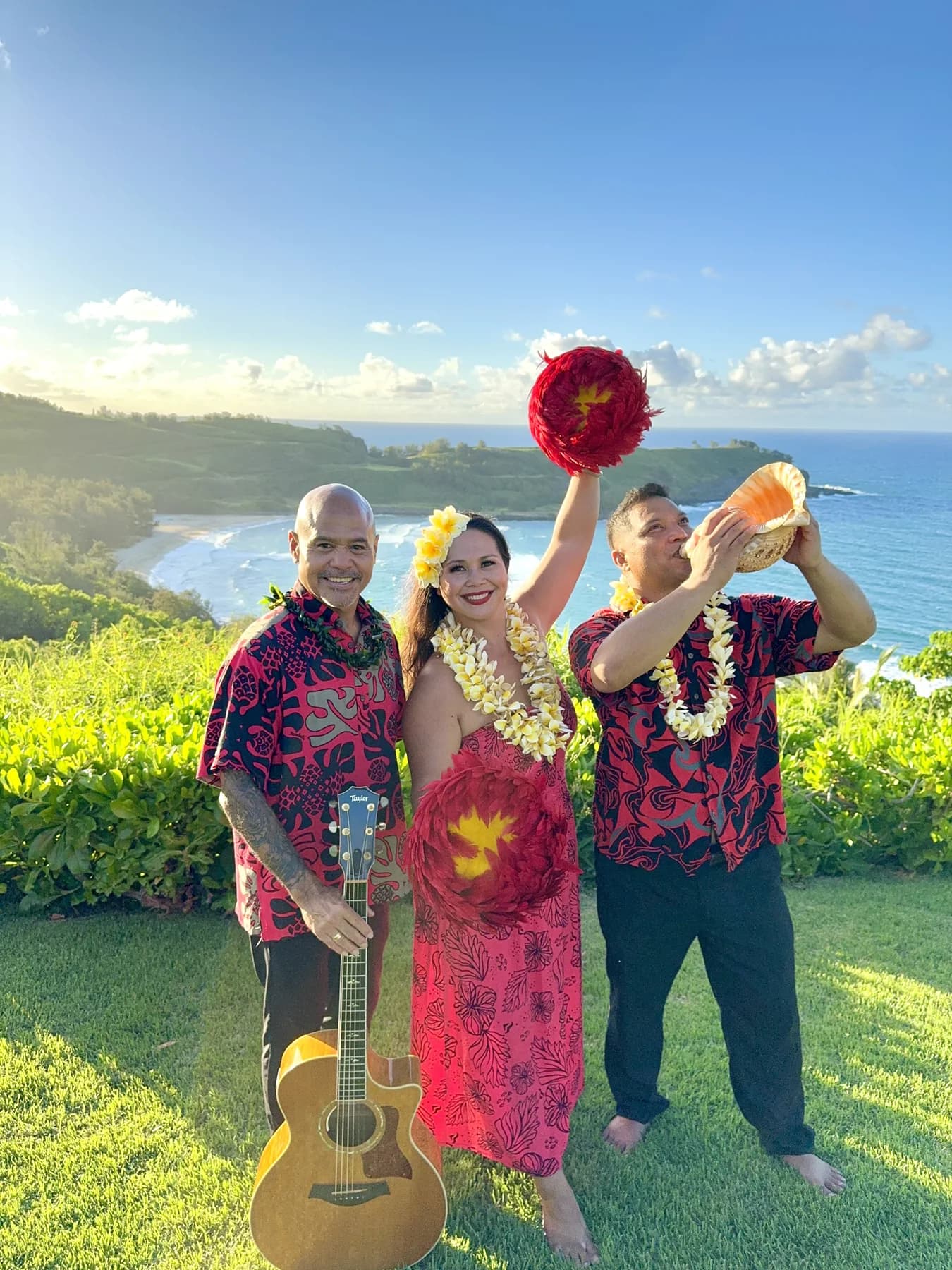 Musician, hula dancer, and conch shell performer outdoors