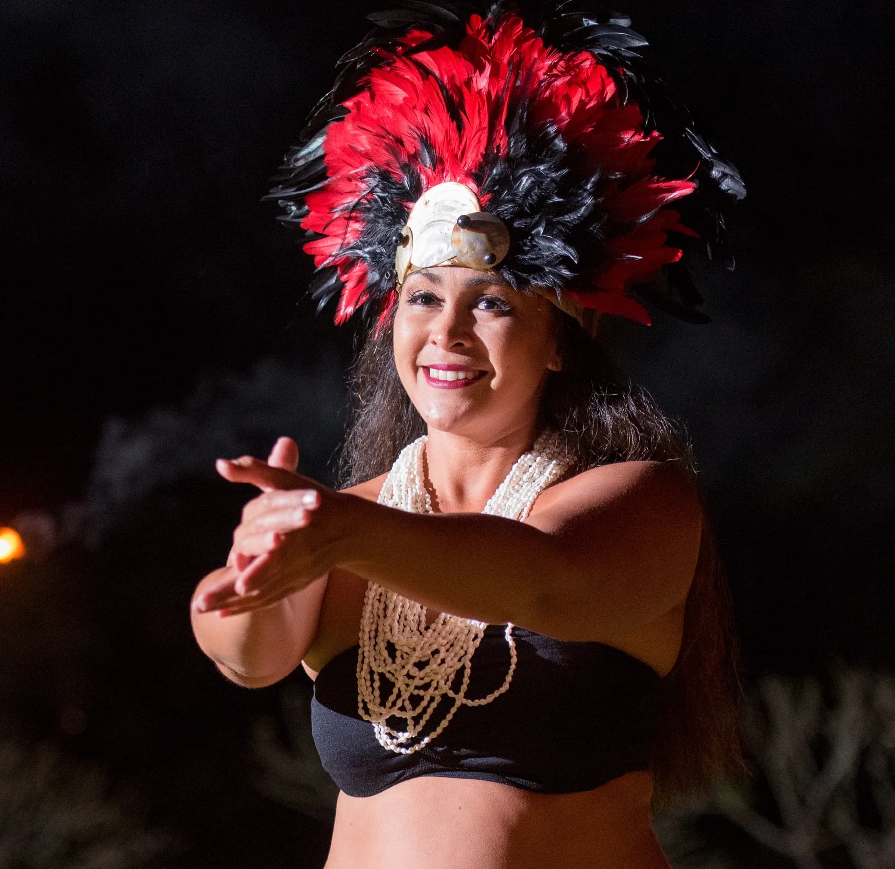 Tahitian dancer performing in ceremonial costume